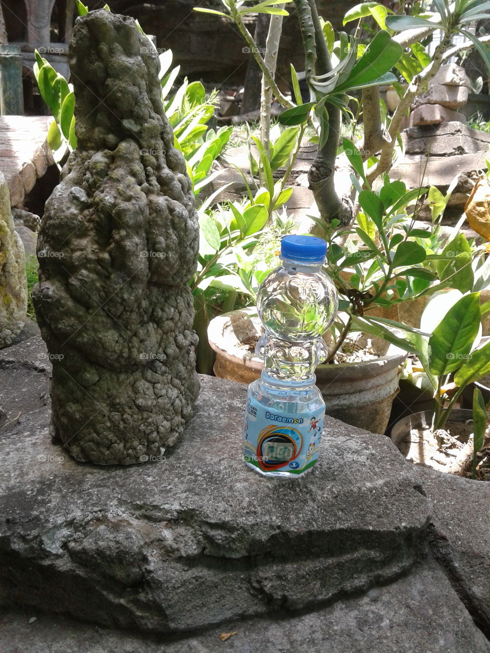 Doraemon Bottle standing with unique stone...