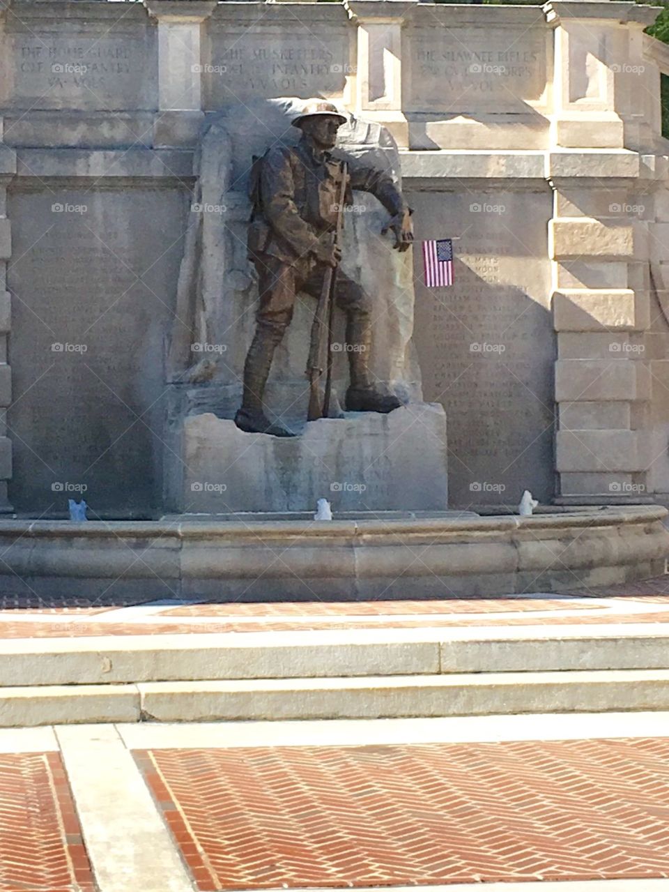 Statue of a soldier veterans names