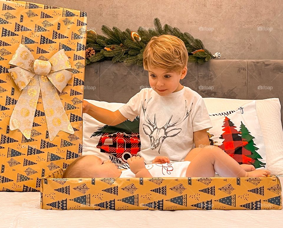 Surprised BOY with a blessed gift.A sister