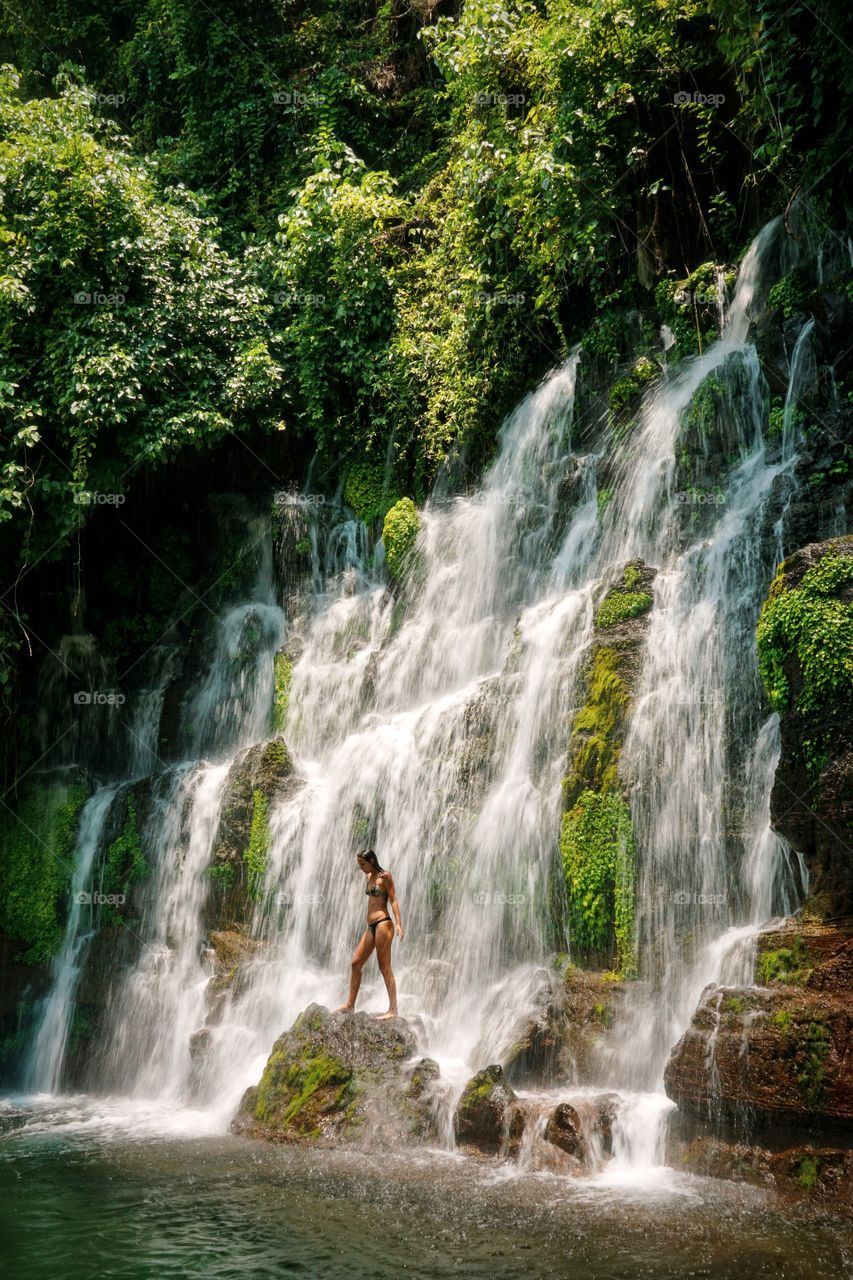 Refreshing in this beautiful waterfall somewhere in El Salvador