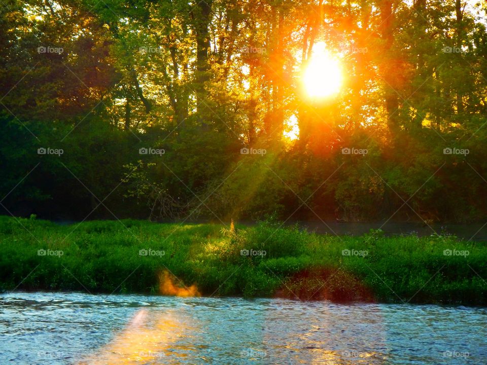 Sunrise over the river in Indiana 
