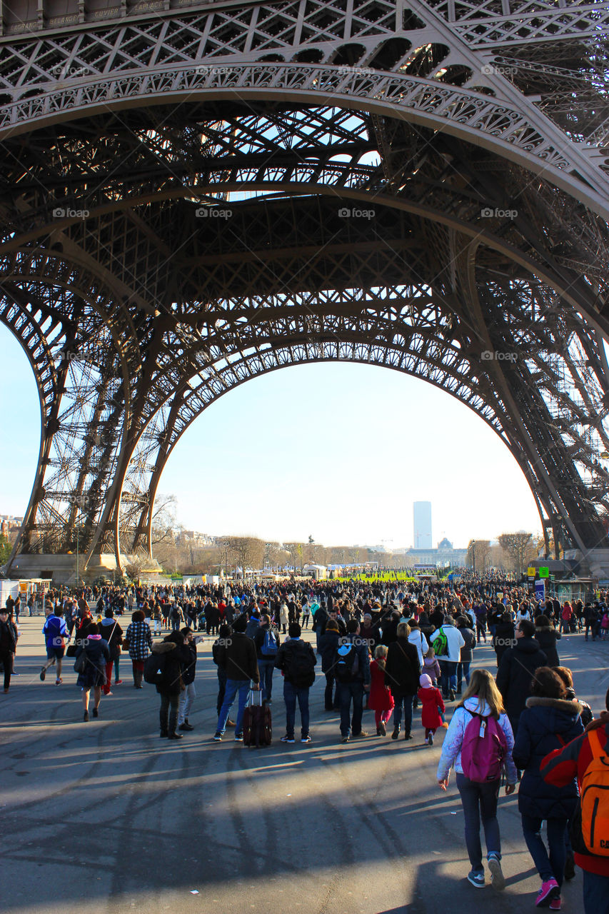 People under the Eiffel tower,Paris,France