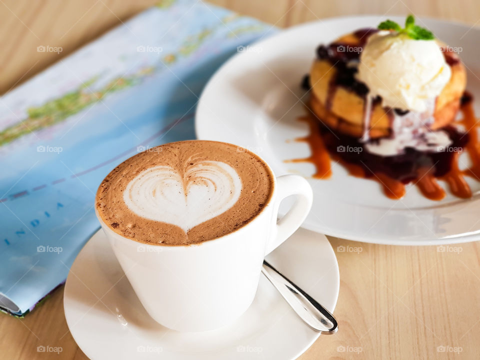 Kickstart travel planning with warm cup of coffee and delicious dessert. Mouthwatering everytime I recalled this moment.