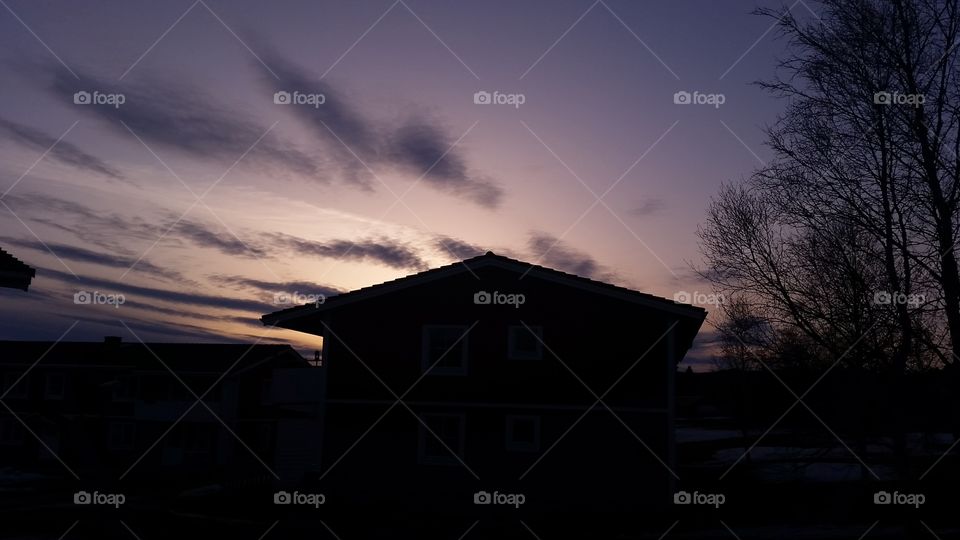 Sunset behind the house.