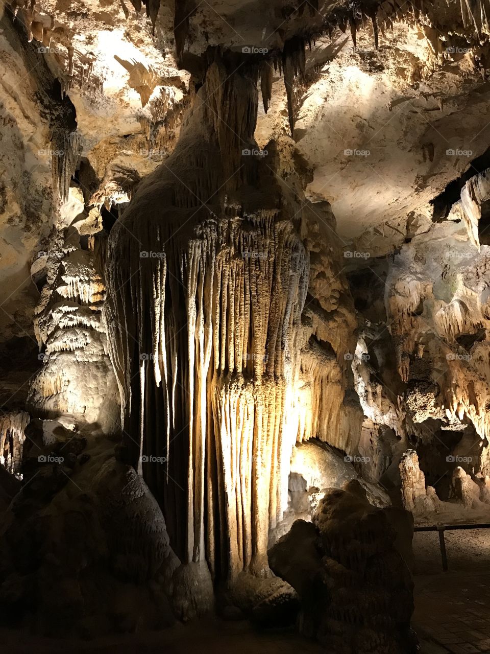 Illuminated column cave formation in Luray Caverns, West Virginia 