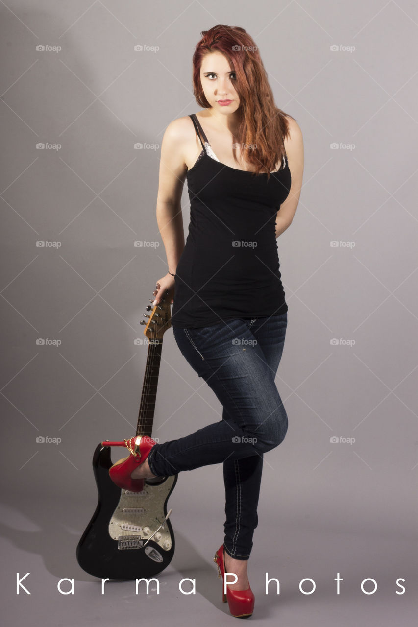 Shy Rocker. Model with guitar