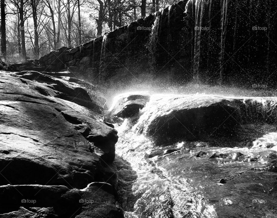 White water on black rocks 