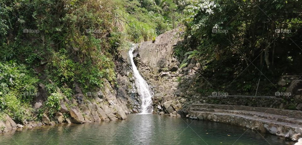 The place is nice, approachable people, fresh and clean. It is located at Valencia negros oriental Philippines. It's pulang bato falls.