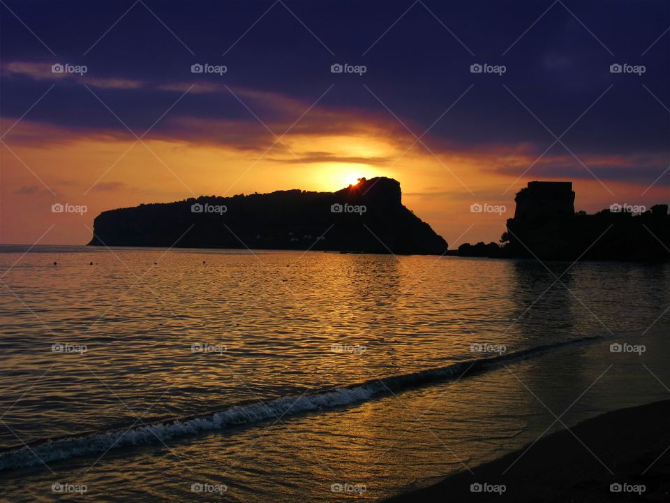 Islet of Dino at sunset  (Praia - Italy ).
