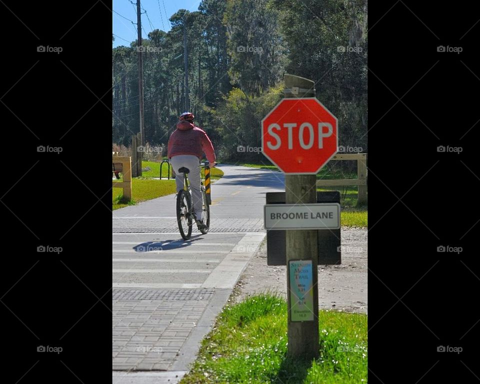 Stop sign on a bike trail