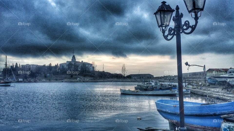 Clouds above harbor