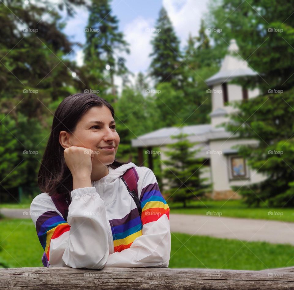 Calm mood of a woman in front of a church