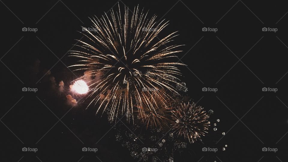 The fireworks had never been so beautiful. A lot of people had their phones out and i just got a snap, right when it was the most beautiful. Spread like hugging the night sky then disappearing once again.