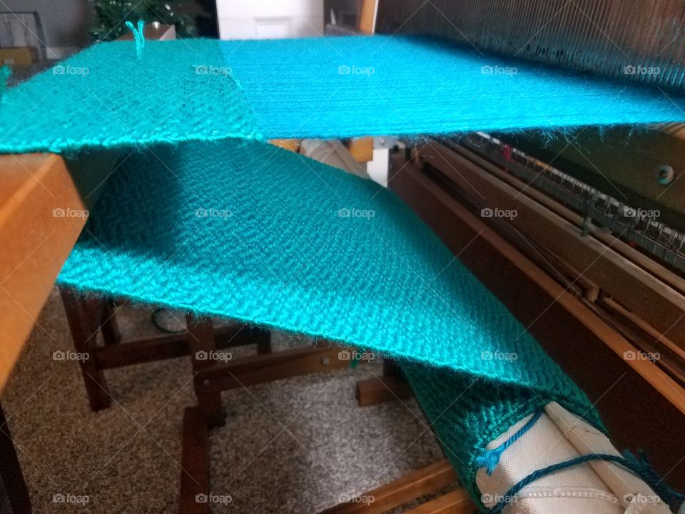 weaving on the loom