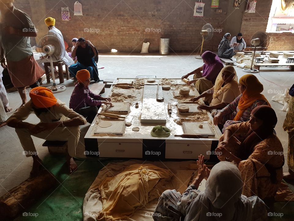 preparing food for devotees