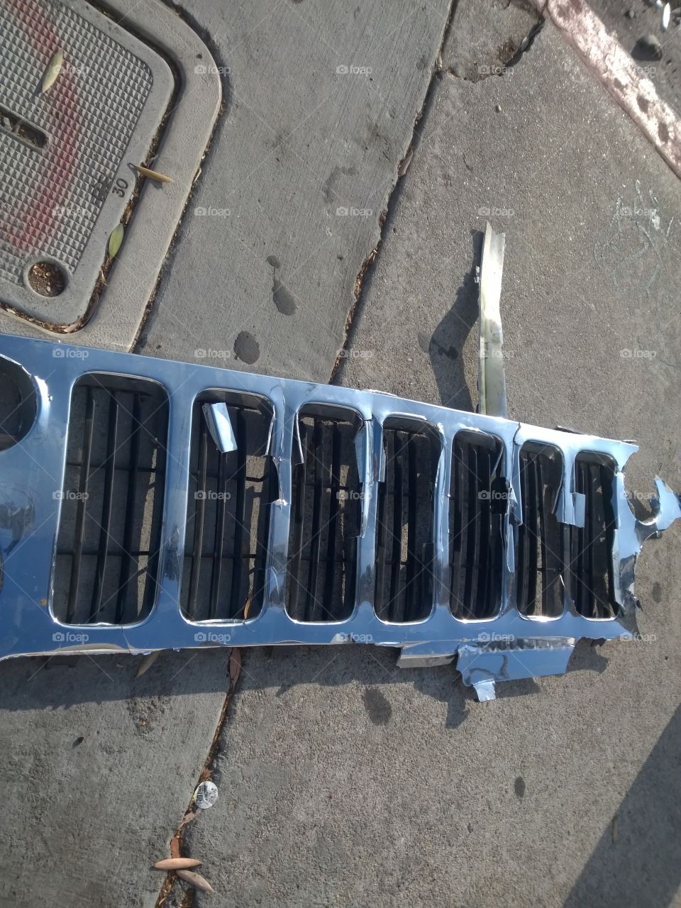 Dislocated grill from a car.