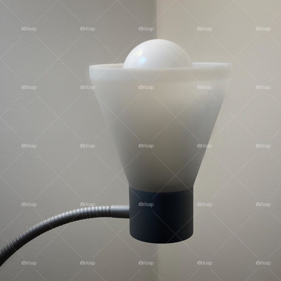 Lightbulb in a lamp with a flexible arm