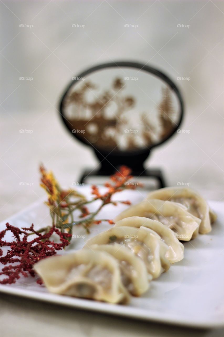Close-up of a dumpling in plate
