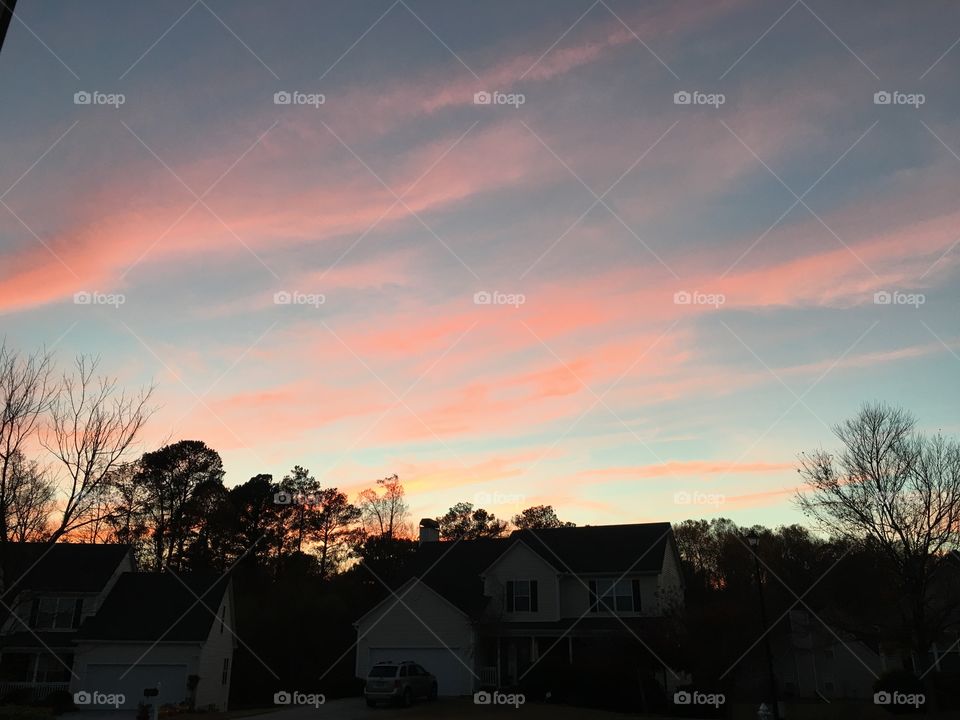 Sunset in a neighborhood sky.