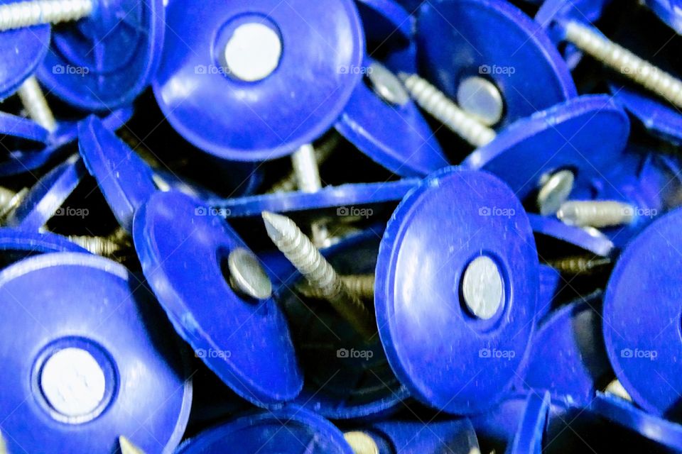 Blue capped roofing nails