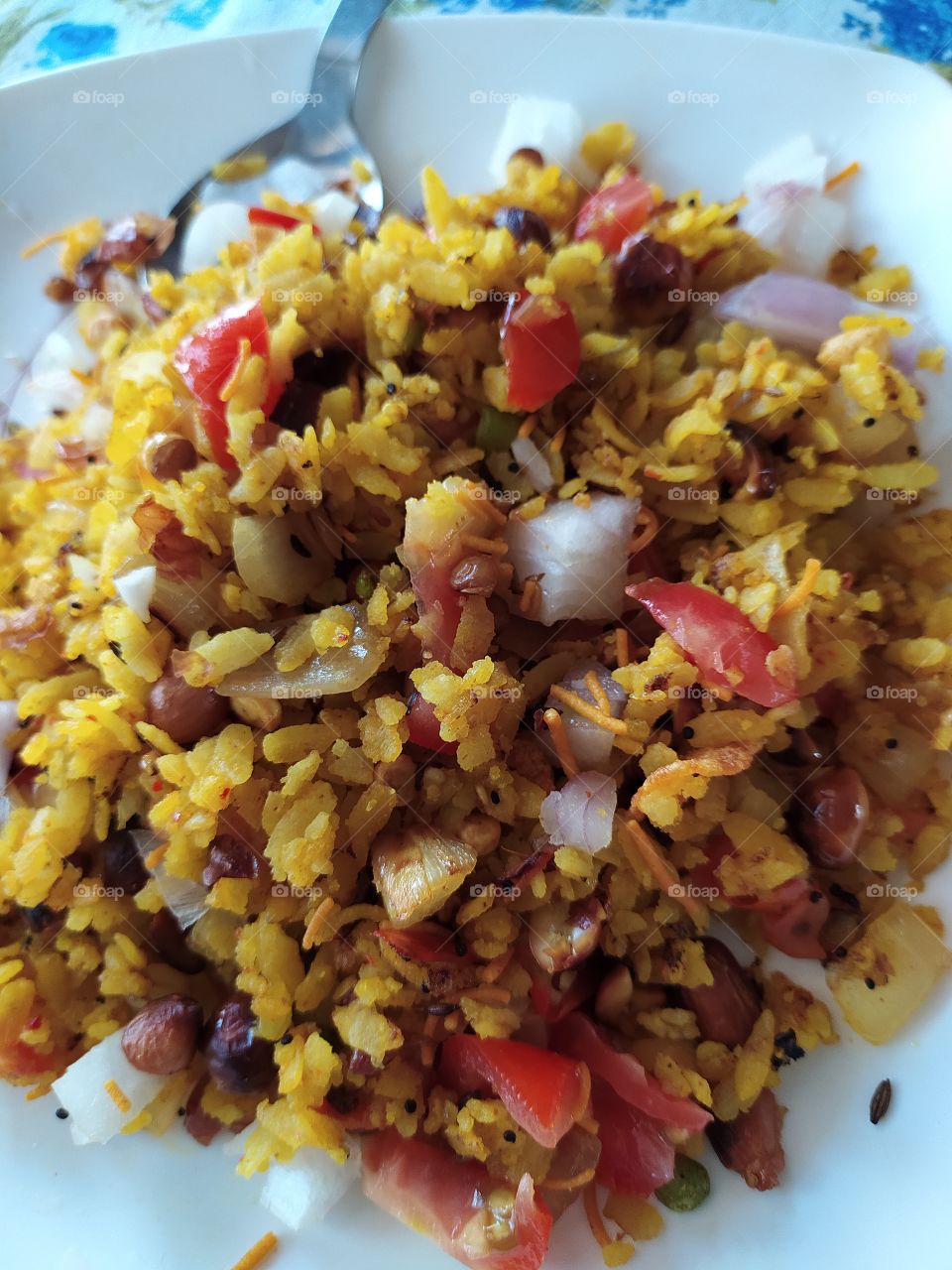 Poha: flattened rice dish, a delicious and nutritious breakfast on a Sunday morning