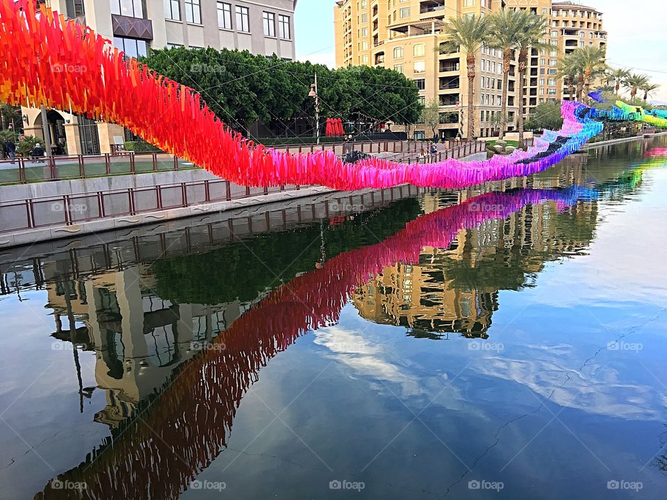 Reflective art and water.