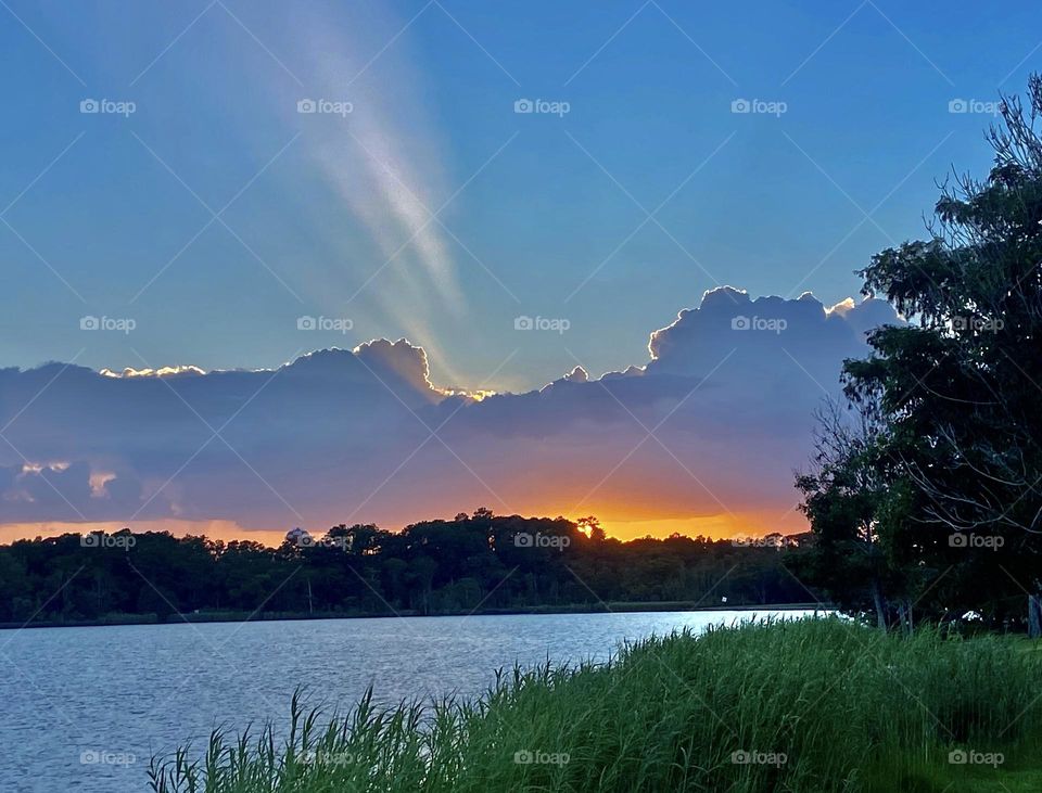 Colorful and peaceful sunset over an inlet 