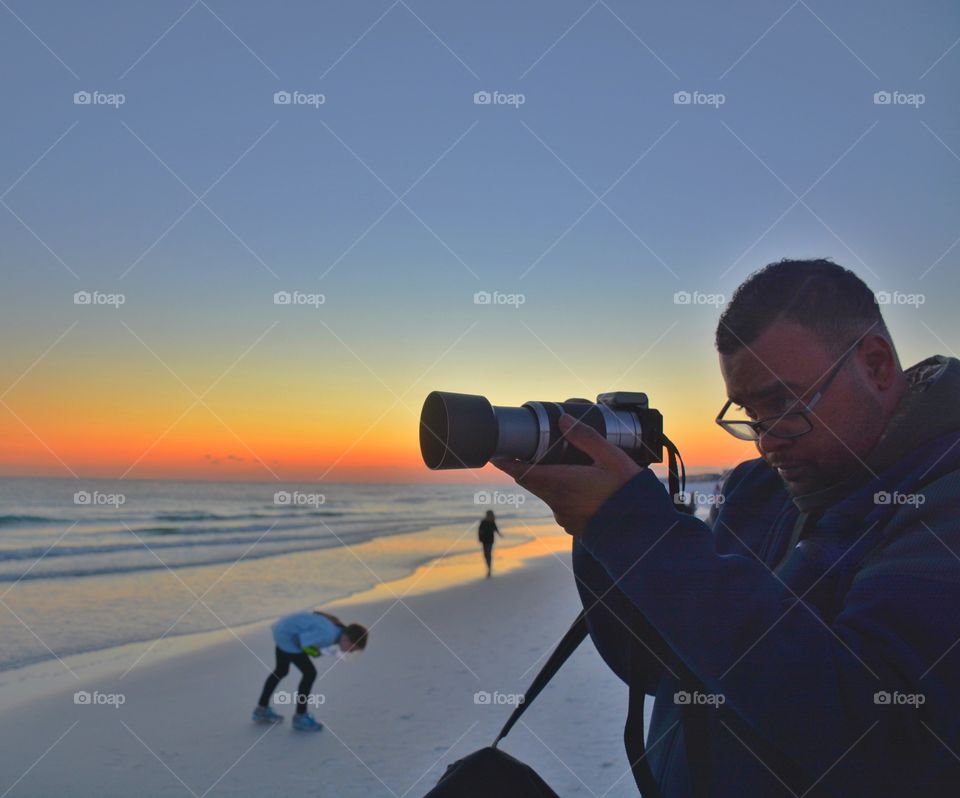Photographer in action photographing the beauty of the Gulf of Mexico!