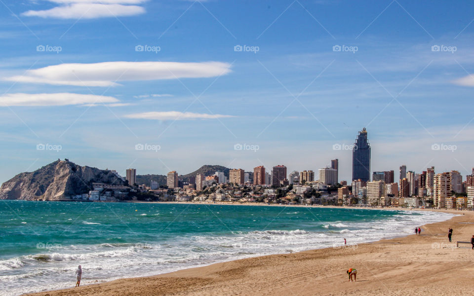 Beautiful beaches filled with peaceful waves and strolling couples 