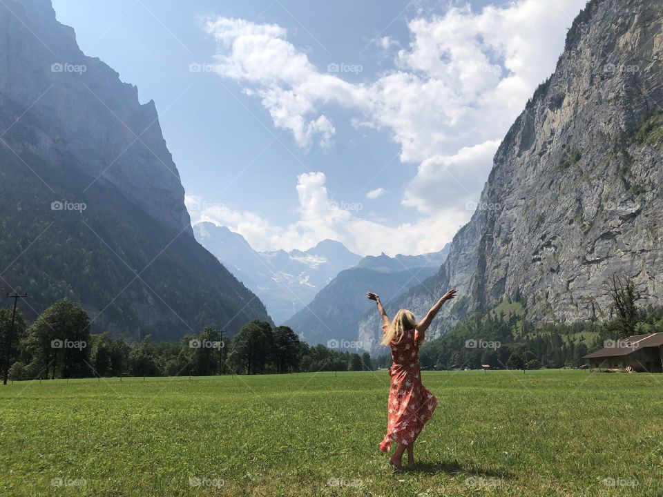 My mother celebrating freedom and travel, with a good old-fashioned twirl in a Swiss alpine meadow 