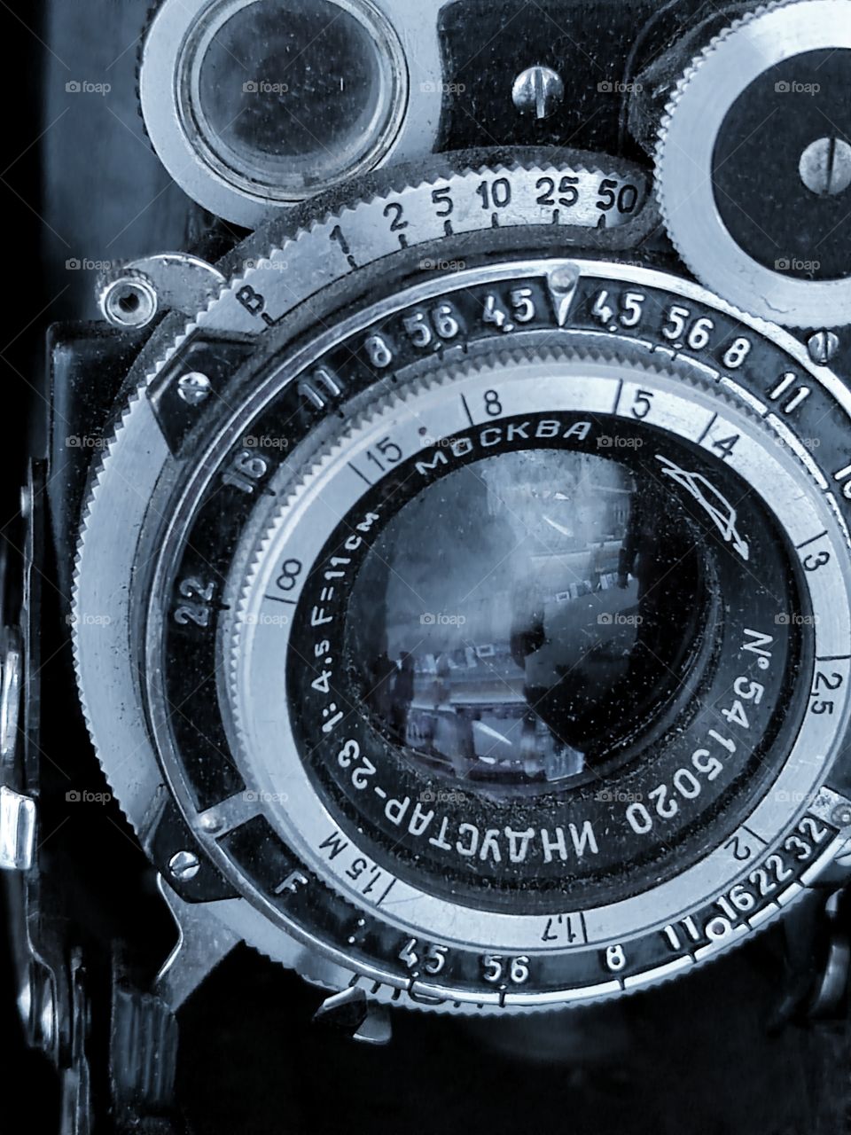 The lens of the film folding medium format camera Moscow-2.  Industar-23 110mm / 4.5