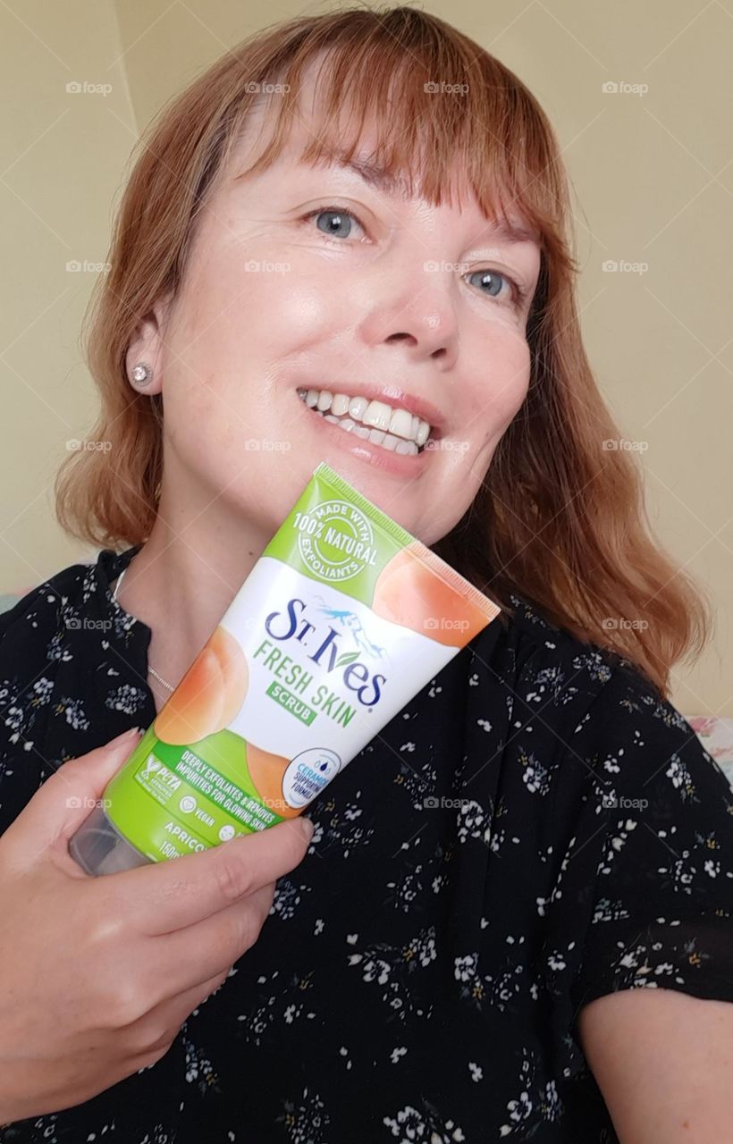 lady holding a beauty product