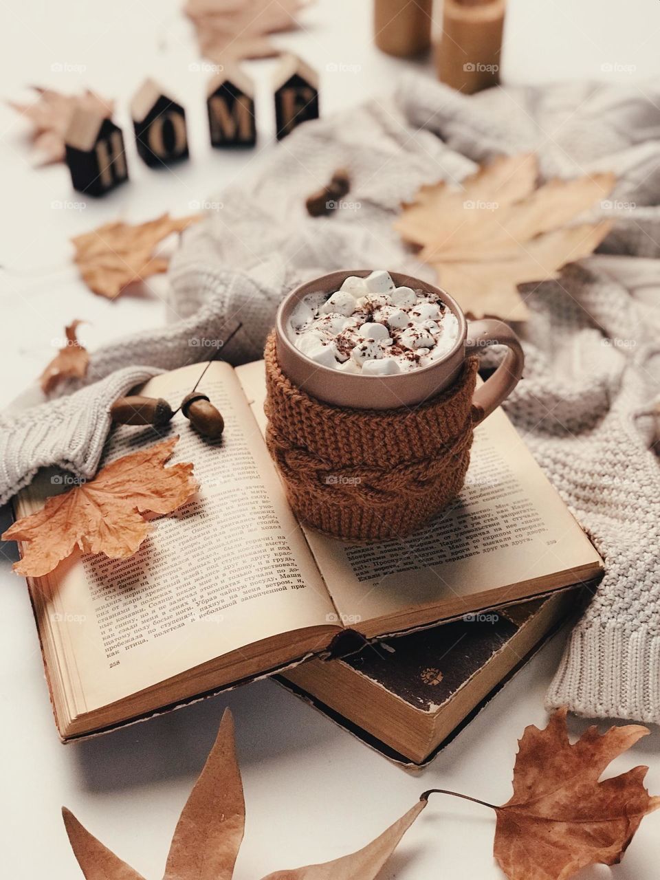 Autumn photography. Tea of coffee with book