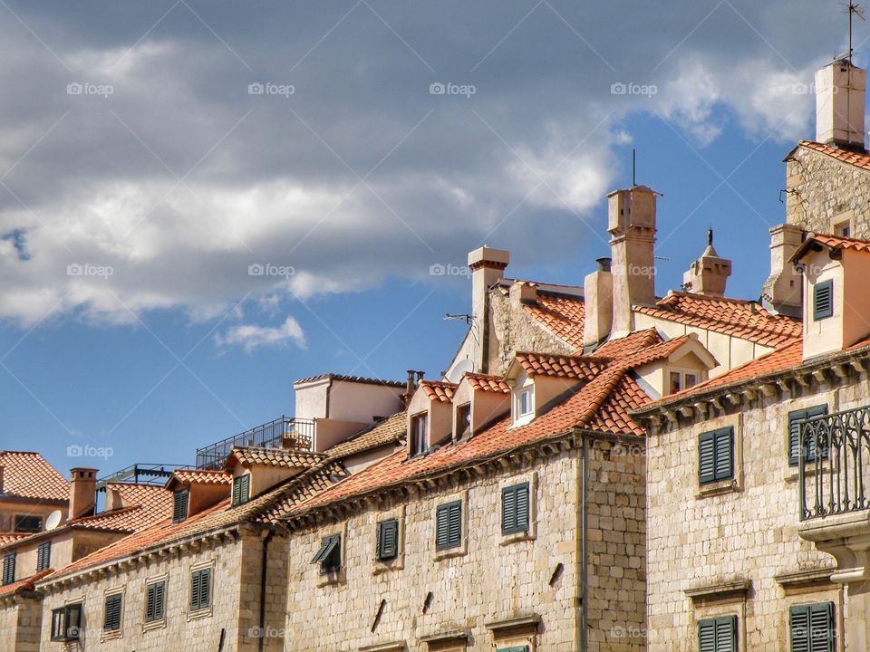 sky and clouds on the roofs