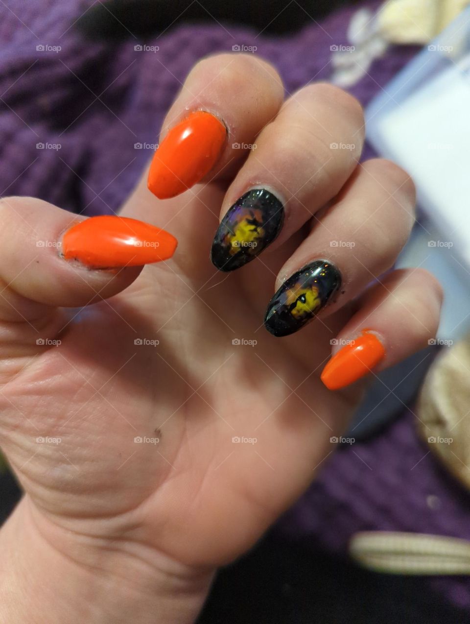 my Halloween manicure. a grave yard with a setting sun