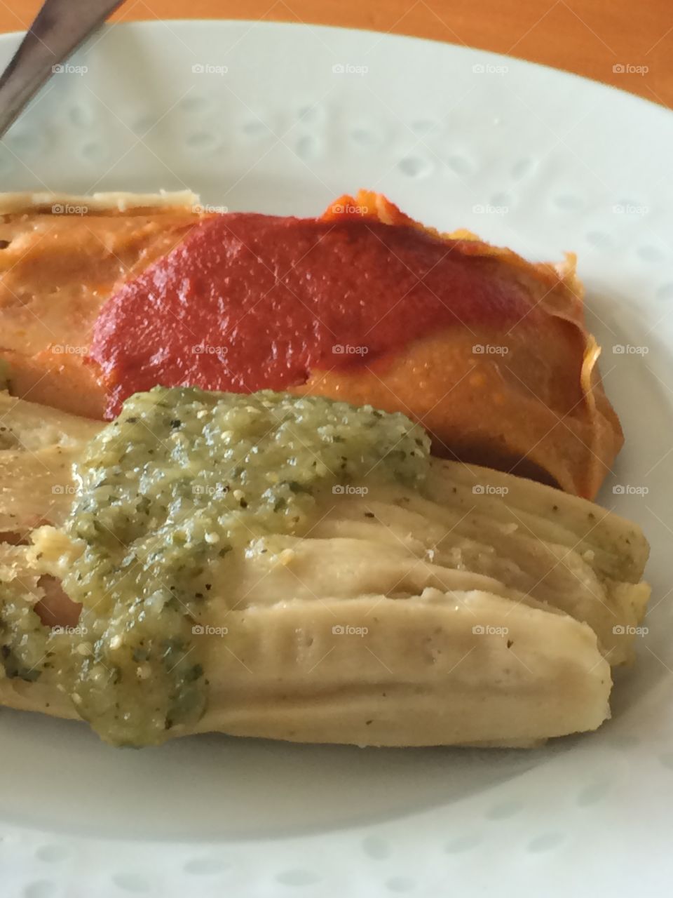 Tamales with red and green salsa