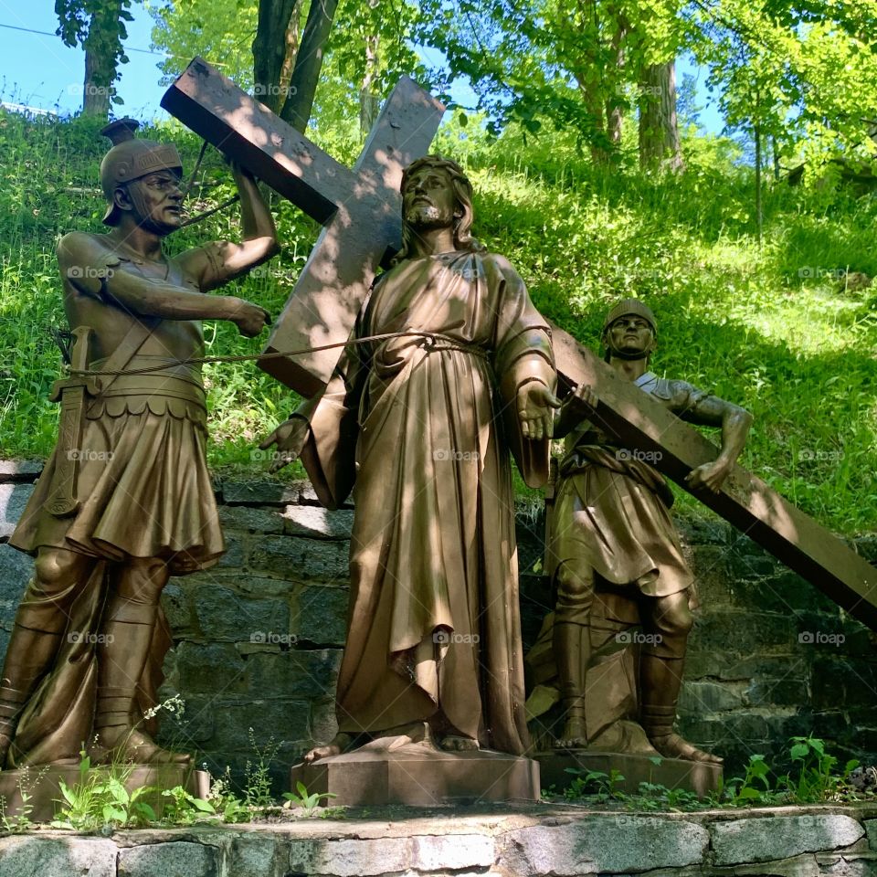 Way of the Cross of Jesus reproduced by magnificent bronze statues behind the small chapel of Ste-Anne-de-Beaupré, Quebec, Canada 🍁