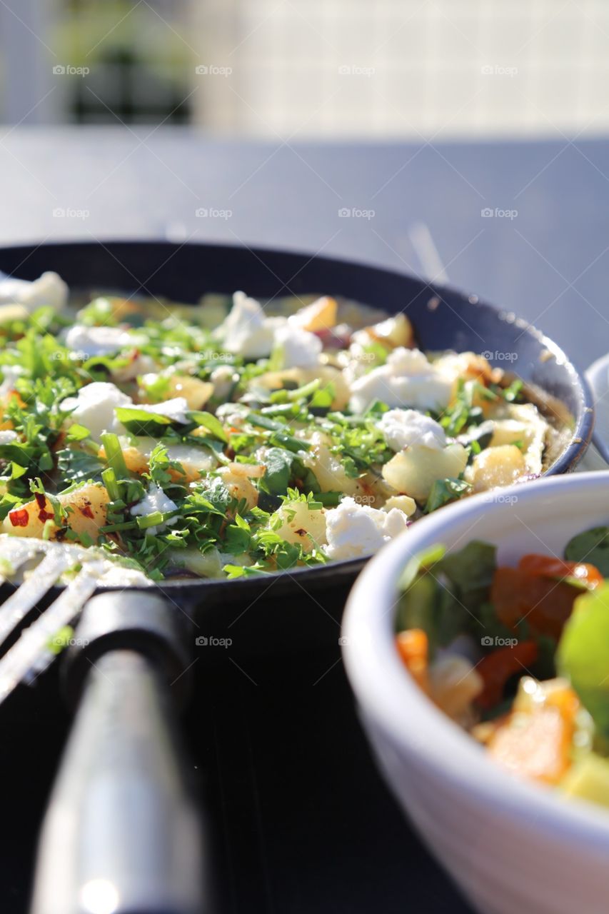 Lunch. Lunch with salad, chicken and omelette with potatoes , herbs and goat cheese