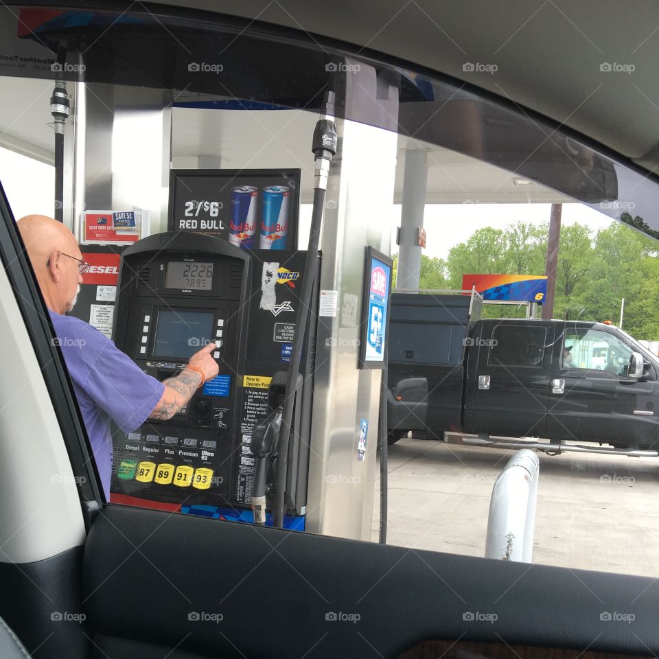 Pushing Buttons On Gas Pump, Self Serve