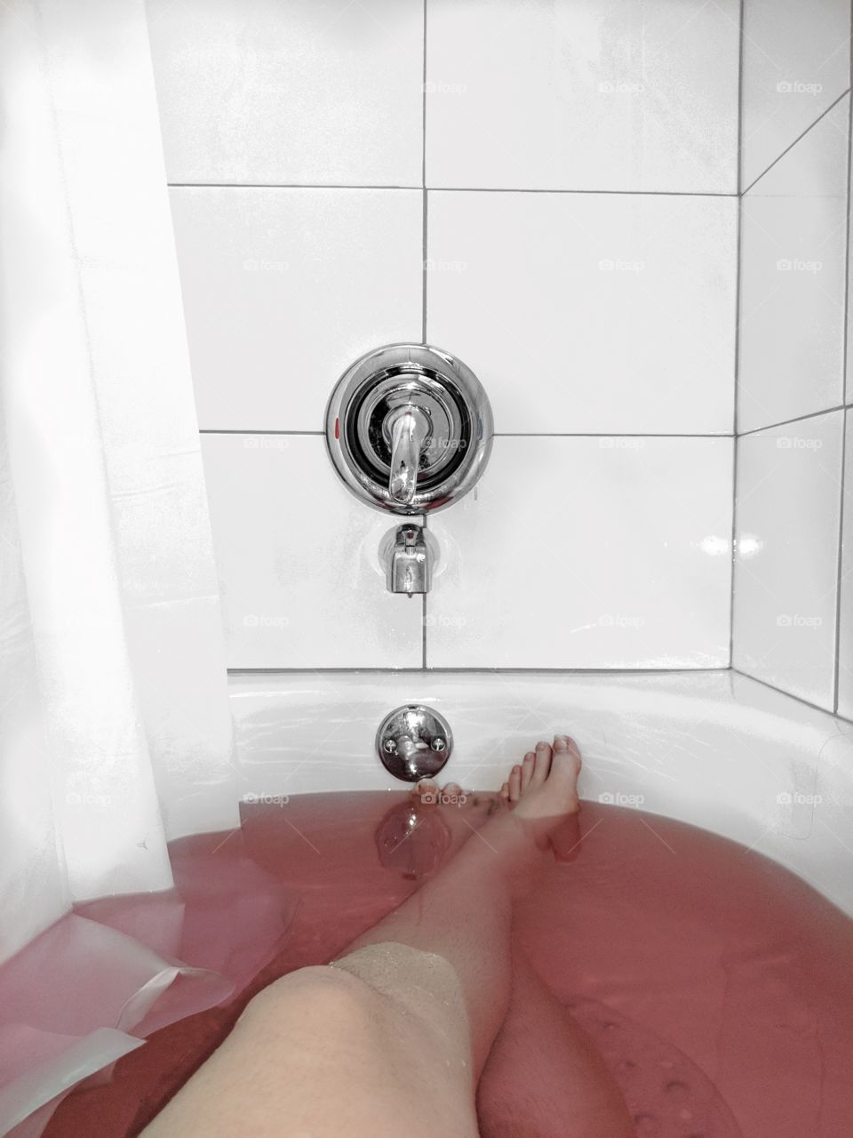 Lush bath bomb in a minimalistic bathroom