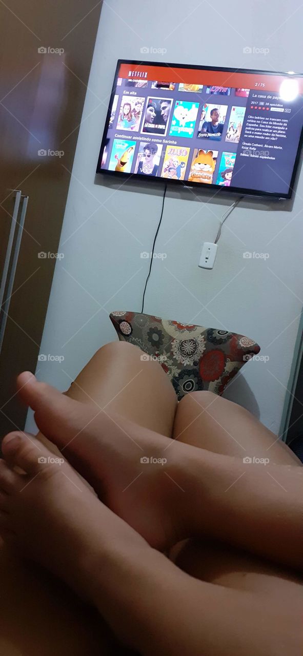 Me and the puppy watching Netflix lying down.