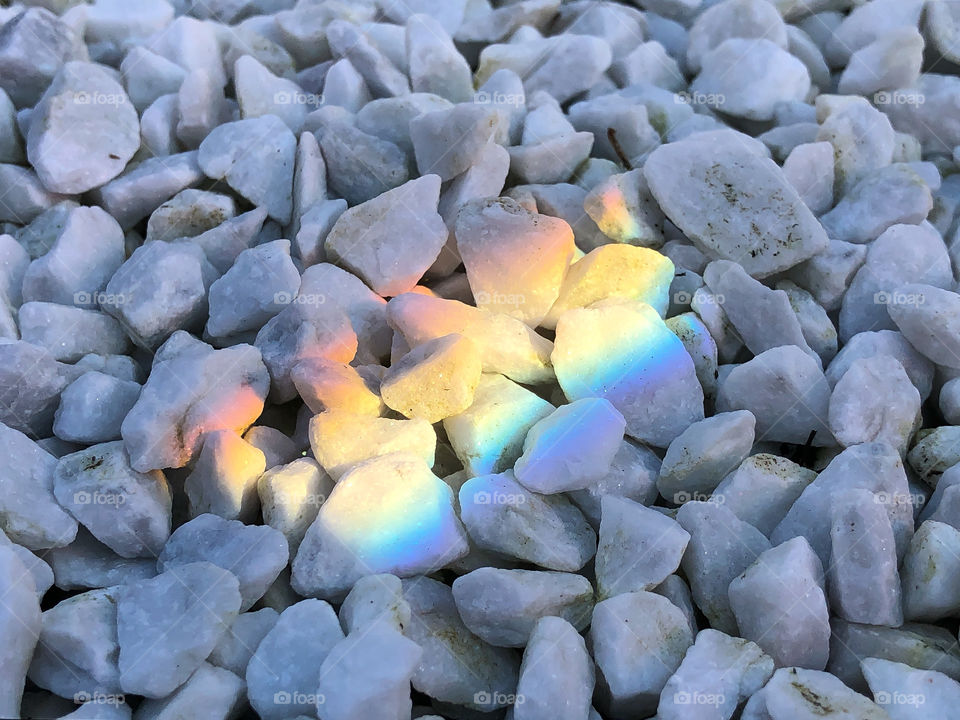 Stones and glow of a grave light