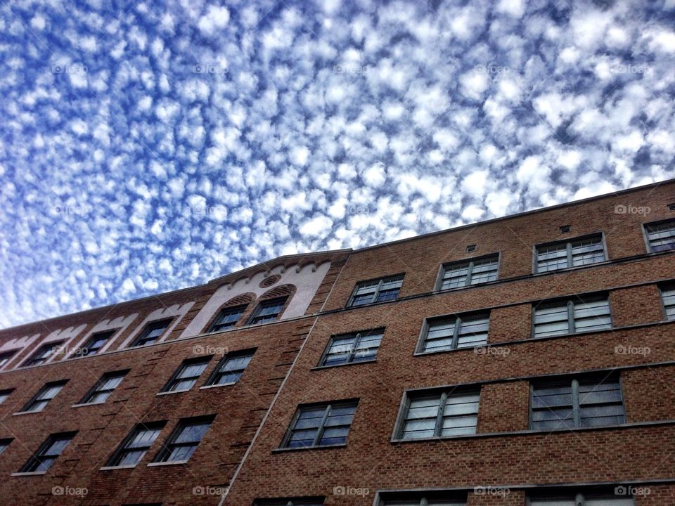 Building with sky and clouds