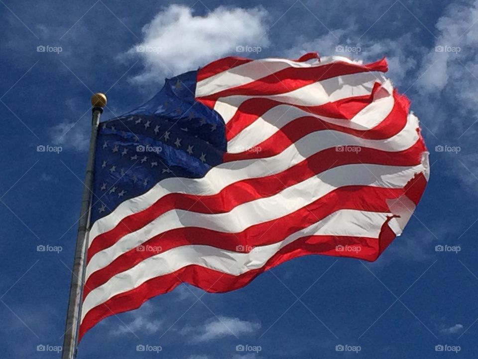 American flag waving in wind.
