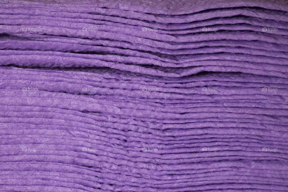 Stack of purple napkins