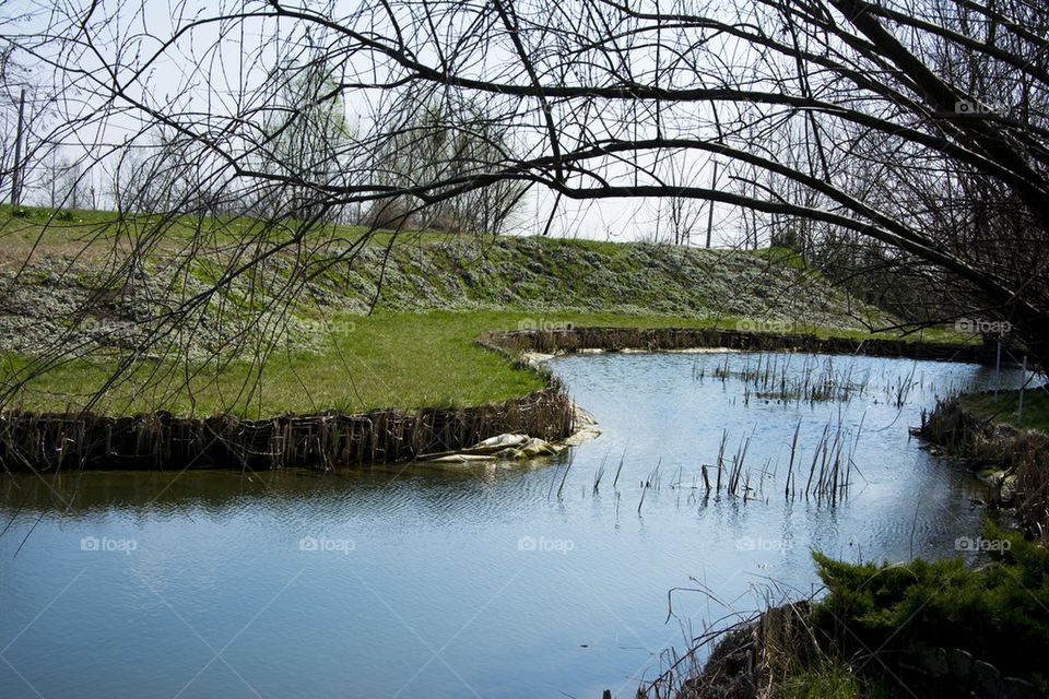 small artificial lake in countryside 