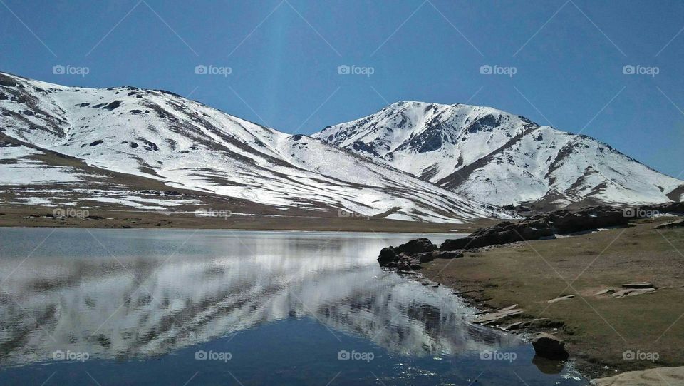 Beautiful landscape:  a mountain covered by snow at marrakech in Morocco.