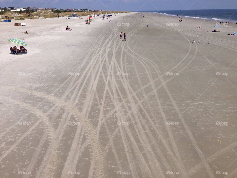 beach sand island tracks by cable