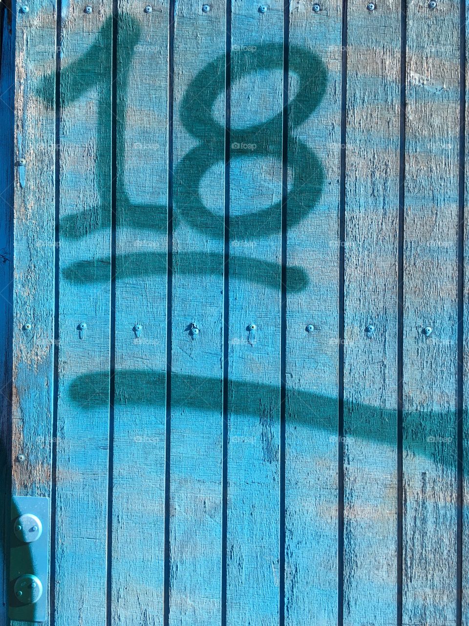 Blue door number 18