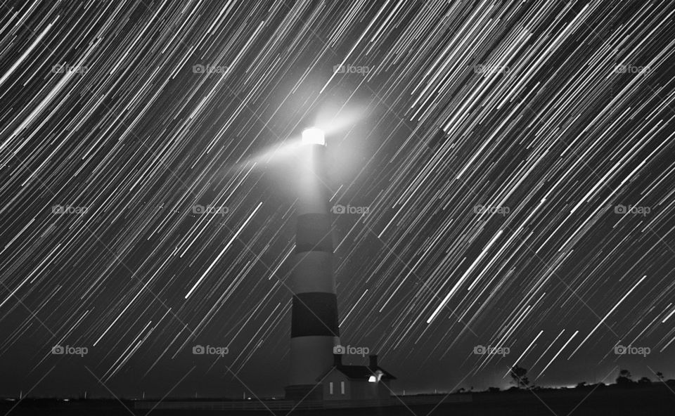 Star trail behind the lighthouse